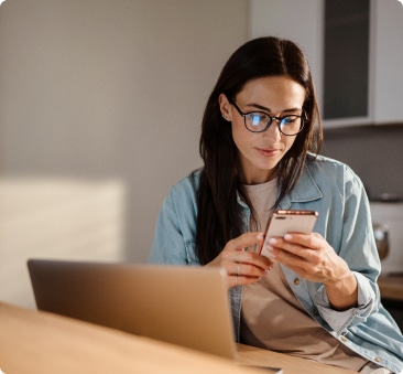 young woman looking at phone